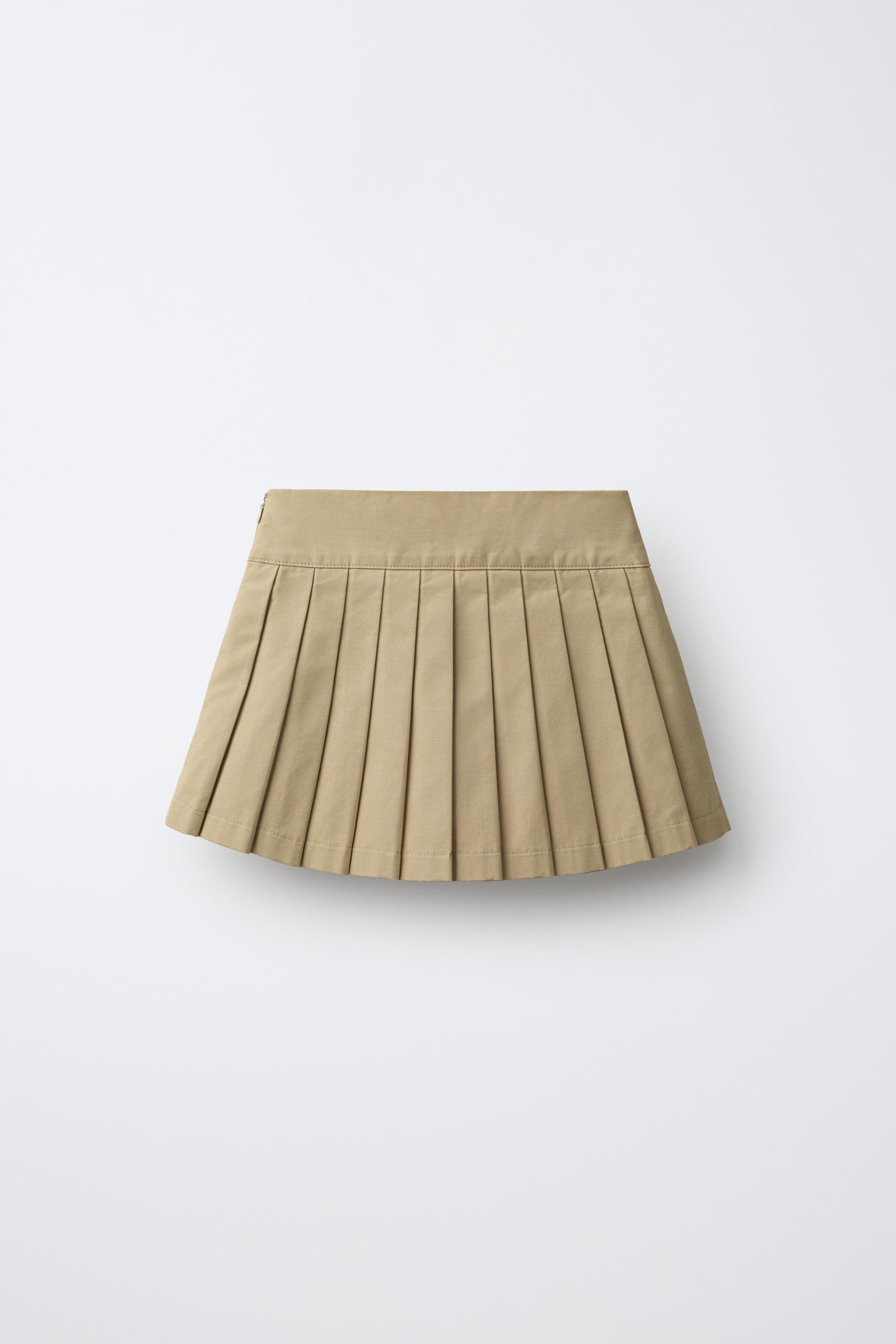 SOLID PLEATED SKIRT